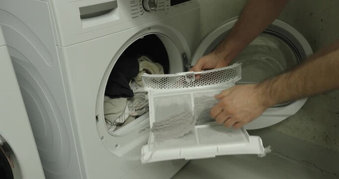 Cleaning Washing Machine Lint Filter During Appliance Maintenance