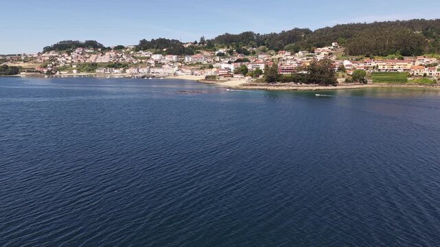 Mussel rafts dotting the waters of ria de pontevedra, a key aquaculture area in galicia