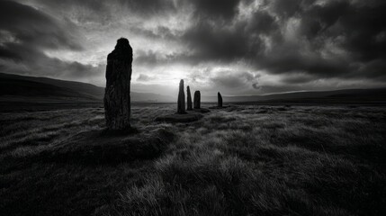 Naklejka premium Ancient Standing Monoliths in a Vast Windswept Grassy Plain Under Dramatic Cloudy Sky