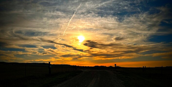 Winding toward a majestic orange sunset