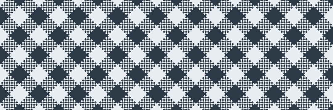 A seamless traditional navy blue and white diagonal argyle plaid banner. Beautiful checkered backdrop design for picnic tablecloth, fabric, and wrapping paper.