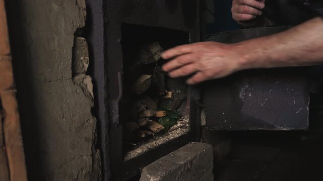 Macro closeup hand tending stove opening, metal door lifted and wood inserted, soot dust settling, intimate maintenance routine of rural stove, sequence shifts from pitmaster to baker to repairman,