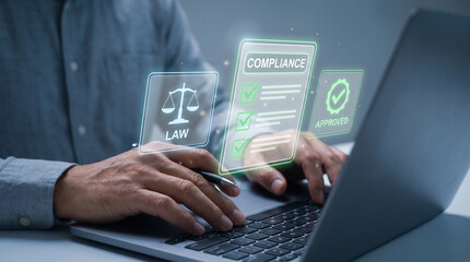 Fototapeta premium Compliance and law holographic icons displayed above laptop keyboard for regulatory approval