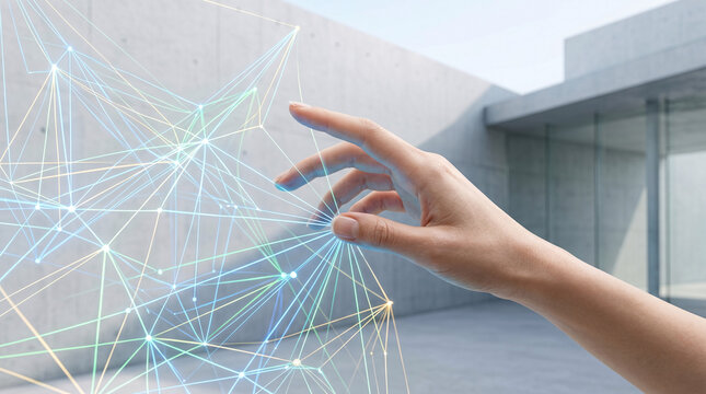Main interagissant avec une interface num&eacute;rique abstraite et futuriste