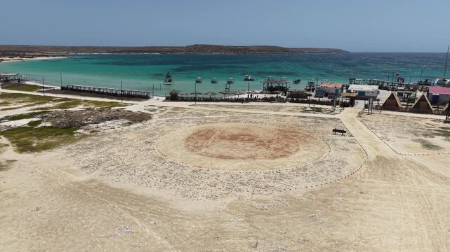 Aerial top down view of eco resort beach club in Cubagua
