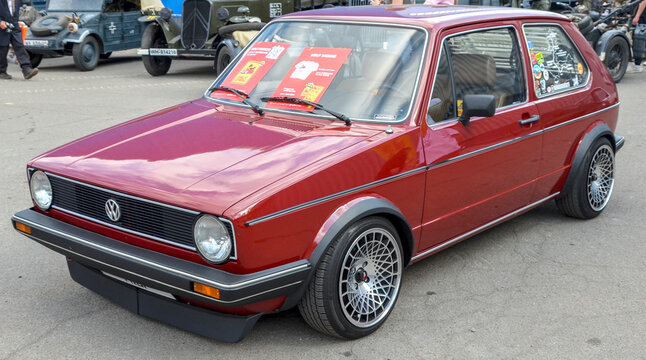 Legendary dark red Volkswagen Golf Mk1, a car that became a true icon and defined the concept of the hot hatchback for generations
