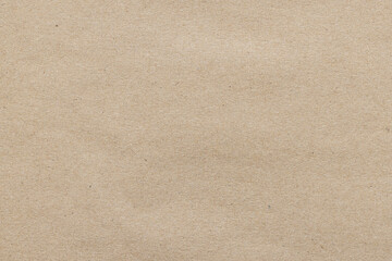 Fototapeta premium Brown Paper Texture Background,Macro,A high-resolution, full-frame top-down view of a plain, light brown recycled craft paper texture, featuring a clean, minimalist surface with subtle natural fiber.
