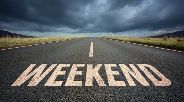 Weekend word painted on asphalt road for a travel journey trip and holiday time