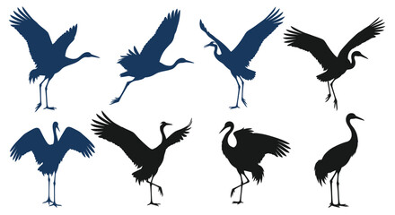 Fototapeta premium Silhouettes of cranes in flight poses.