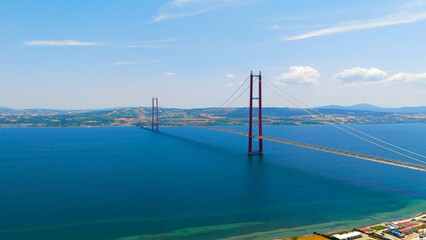 Fototapeta premium Lapseki, Turkey. 1915 Canakkale Bridge Aerial View on Sunny Day, Drone Shot of World s Longest Suspension Bridge Over Dardanelles Strait. Aerial View