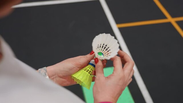 Comparing various shuttlecock attributes. Assessing and contrasting shuttle quality for superior performance. Evaluating multiple shuttlecocks to identify most effective for competitive play