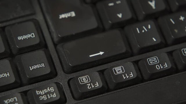 Tapping backspace key close up macro