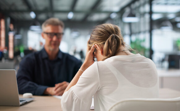 Two Office Workers Discuss Hiring Mistake During Tense Disciplinary
