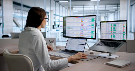 Young Woman Medical Coding Specialist Reviews Billing Data