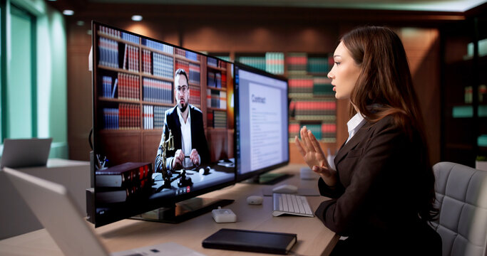 Young Female Lawyer Discussing Case Details During Virtual Video Conference