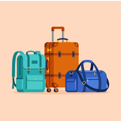 Fototapeta premium A collection of colorful travel bags arranged on a plain background