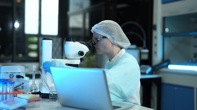 Environmental scientist testing water quality sample for microplastics and chemical contaminants in laboratory.	