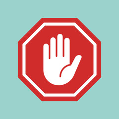 Obraz premium A red octagonal sign featuring a white hand symbol for caution