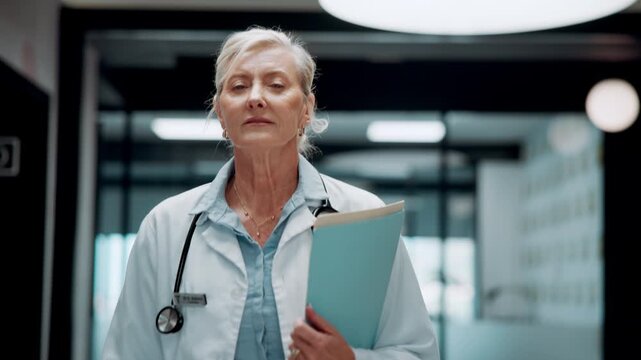 Medical, entry or woman in hospital with walk, shift arrival or morning prep in patient care. Healthcare, stroll or mature doctor with file, workplace operations or getting ready for clinic treatment