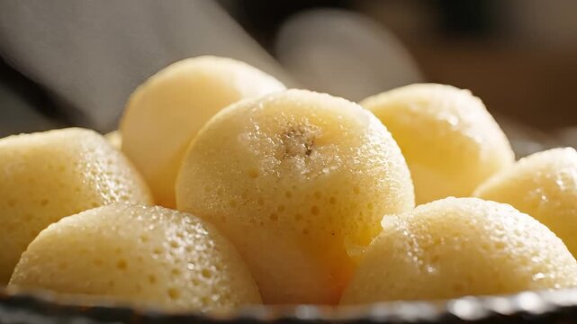Delicious Indian Sweet Rasgulla Served in a Bowl Close Up.