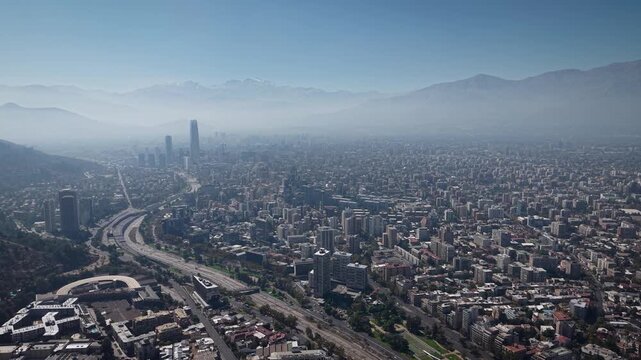 4K aerial drone footage of Santiago de Chile with Costanera and the Andes on the back