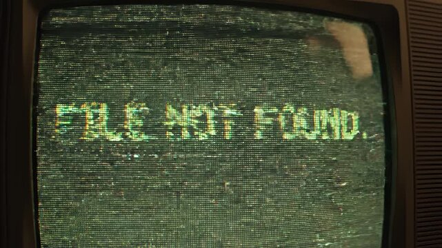 Retro computer screen displays file not found error message with static.