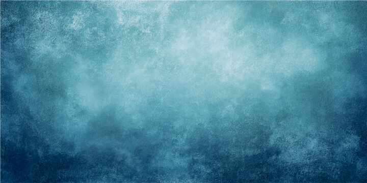 Abstract teal and blue grunge texture background with atmospheric cloudy effect and grunge artistic wallpaper with rough painted surface and textured pattern.