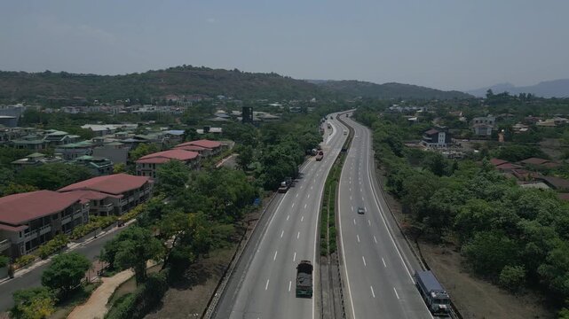 Wide Aerial Shot of Expressway Traffic Flow Near Lonavala