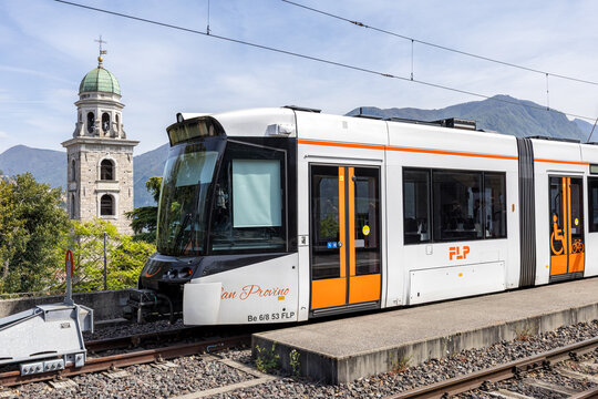Commuter train type Stadler Rail Tramlink on Lugano Ponte Tresa Railway line in Lugano, Switzerland