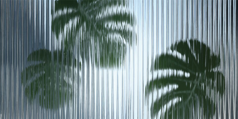 Green monstera leaves viewed through vertical ribbed glass texture with monstera abstract distorted background tropical refraction vertical transparent botanical aesthetic creative © jr graphics