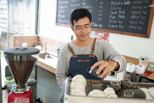 Barista Preparing Coffee For Cafe Service Small Business And