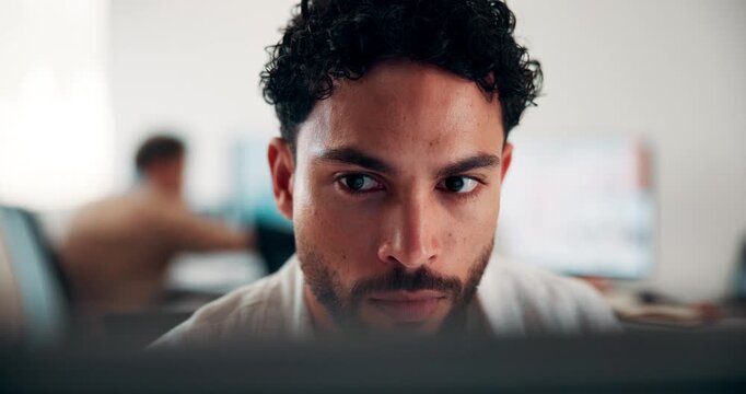 Man, reading and research in office with computer, editing logo design and online marketing project. Coworking, creative person and graphic designer in business with pc, campaign review and planning.