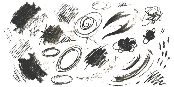 Set of black hand drawn pencil scribble marks and abstract charcoal shapes
