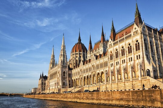Parliament building with dome, towers and gables, landmark on the bank of the Danube, evening light, Budapest, Hungary