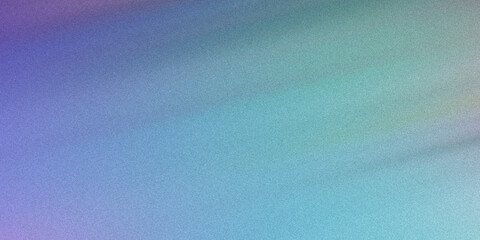 Obraz premium Abstract soft blue and purple gradient background with grain effect creating smooth dreamlike atmosphere for creative design works.