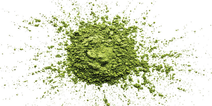 A pile of organic green matcha tea powder spread out on a flat surface