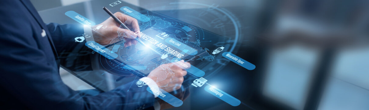 Community manager point of connection and sharing. Manager using tablet moderating user profiles across the vast social network. Fostering digital engagement and global communication.