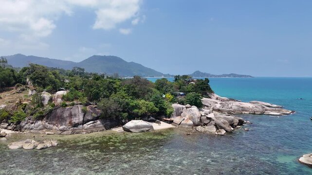 Aerial Inner Coast Orbit Around Hin Ta Hin Yai Rocks Revealing Lamai Beach in Background Koh Samui Thailand