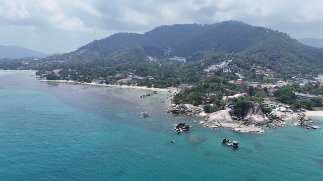 High Aerial Descent Over Hin Ta Hin Yai Rocks Revealing Lamai and Surrounding Beaches Koh Samui Thailand