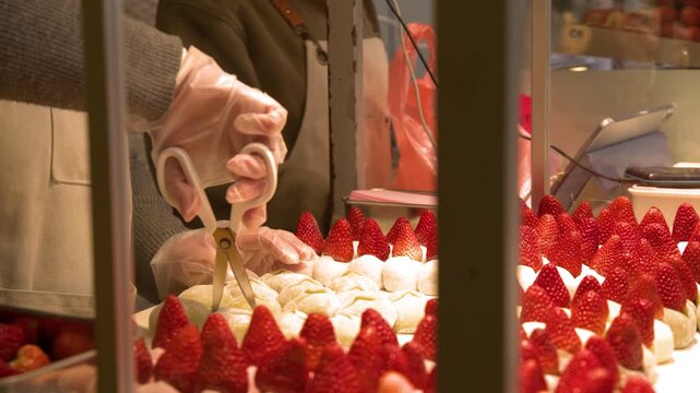 Street Vendor Cutting Strawberry Daifuku Mochi at Tsukiji Outer Market