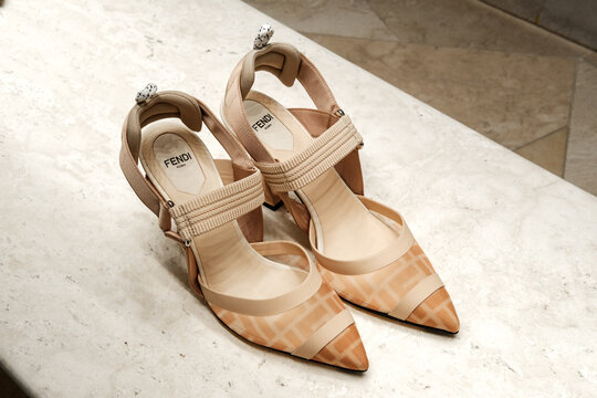 Beige Fendi Pointed Toe Strappy Heels On Marble Display Luxury Designer Shoes  Milan Italy May 14, 2026	