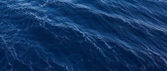 Fototapeta premium Dark blue water background panorama deep ocean sea wave ripple panoramic banner mockup
