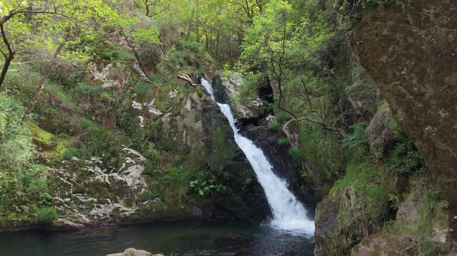 Cascading Streams Of Raxoi Waterfall Near Valga In Pontevedra, Spain. Zoom In Shot
