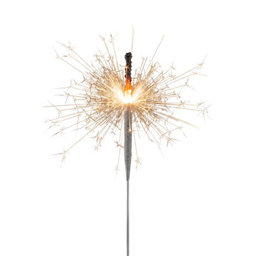 Burning sparkler with bright flying sparks