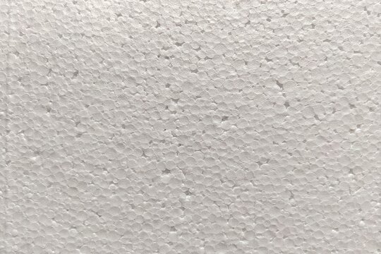 ​Close-up of white styrofoam texture background, expanded polystyrene foam surface.