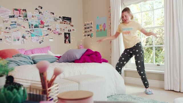 Dancing, music and teenager in bedroom with rhythm, freedom or practice for performance with radio. Groove, creative and girl moving to playlist on weekend with growth, fun and development in house.