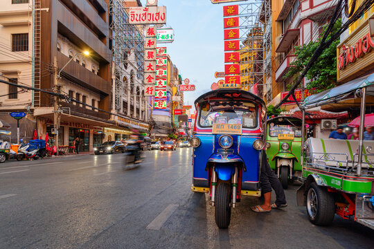 Tuk-tuks parked on Yaowarat Road at Chinatown, Bangkok, Thailand
