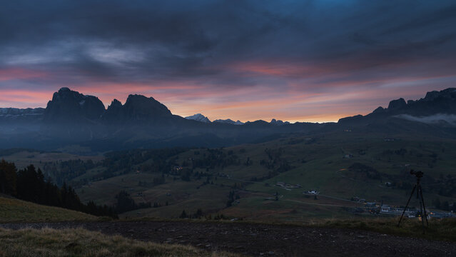 autumnal sunrise over the alps mountain range, Dolomites, Italy