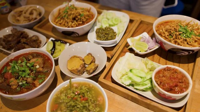 Traditional Northern Thai Cuisine Spread with Khao Soi and Nam Prik Ong