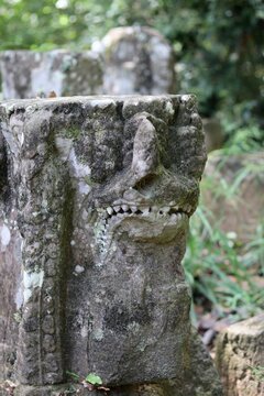 Close Up of Grimacing Stone Face at Prasat Leak Neang